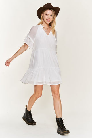 Ruffled neck tiered mini dress