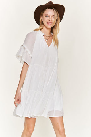 Ruffled neck tiered mini dress