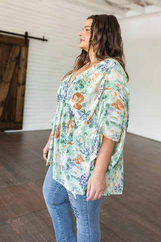 Ivory Garden Draped Peplum Top