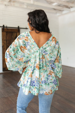 Ivory Garden Draped Peplum Top