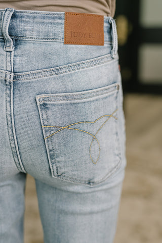 Judy Blue Mid Rise Kick Flare Jeans with Frayed Hem