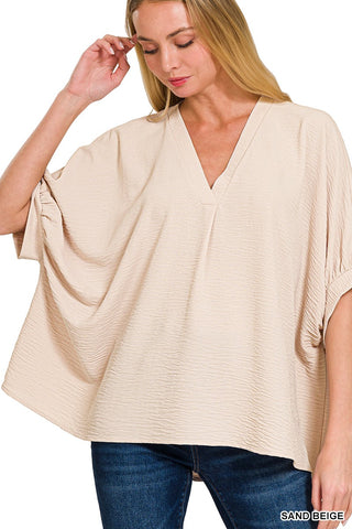 Woven Airflow 1/2 Sleeve V Neck Top