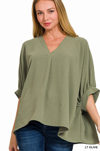 Woven Airflow 1/2 Sleeve V Neck Top